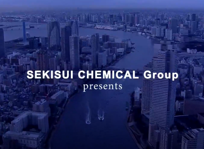 City aerial view with text "SEKISUI Chemical Group presents"